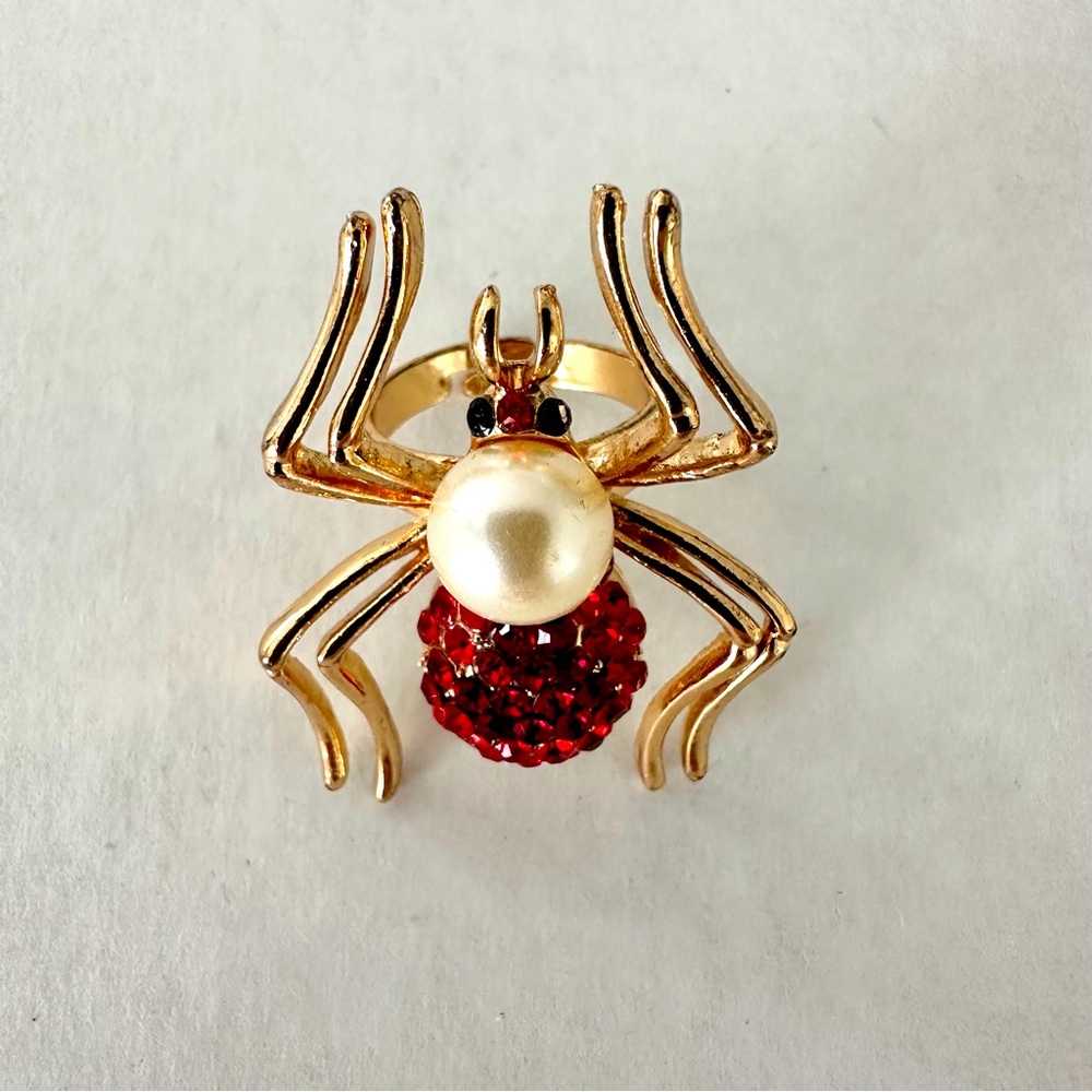 Fashion ring spider adjustable. Never worn.
